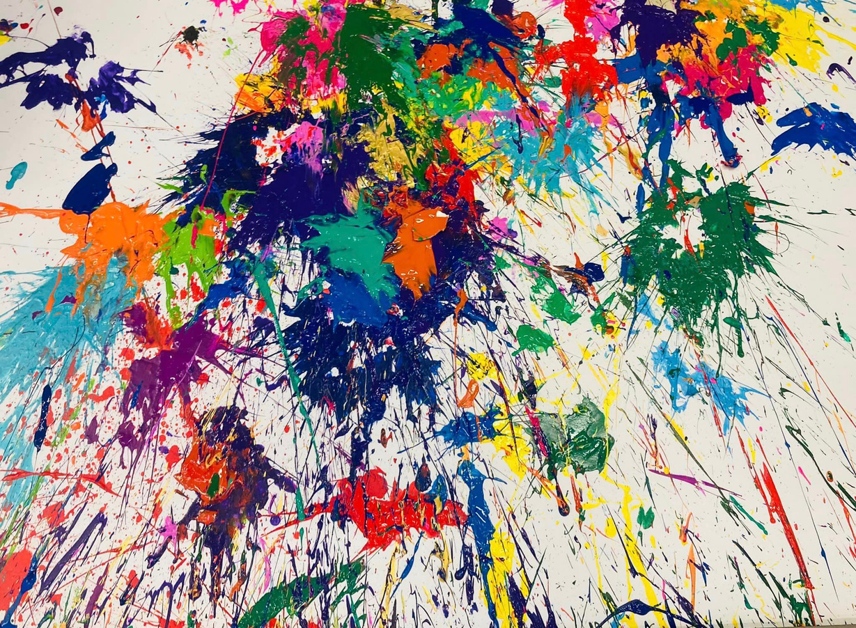 Photo of student splatter paint art.